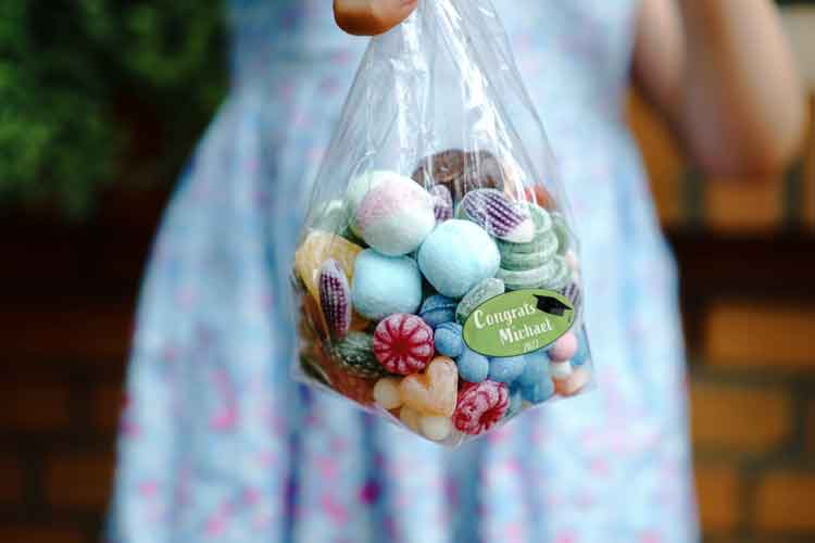 Girl holding bag of candy