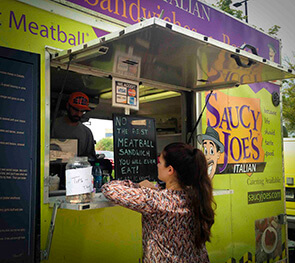 woman at food truck window at baby shower