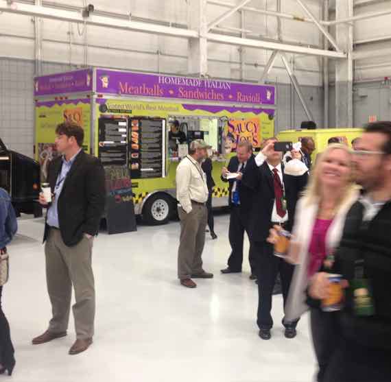 A long line for the Saucy Joe's truck at corporate gathering