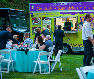 Food truck serving at outdoor wedding