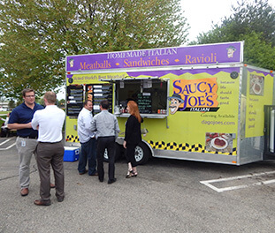 Students at University of Michigan ordering from food truck